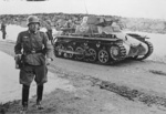 German Oberleutnant Herbert Stemmer in front of a PzKpfw I tank, Norway, 18 Apr 1940