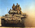 PzKpfw III medium tank in North Africa, circa 1940-1942; note spare wheels and treads mounted in front of the hull
