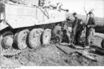 German troops repairing tracks of a Tiger I heavy tank, Italy, Feb 1944, photo 1 of 3