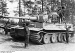 German tankers loading ammunition into a Tiger I heavy tank, near Lake Lagoda, northwestern Russia, Summer 1943