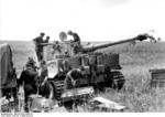 German tank crew transferring rounds of ammunition into a Tiger I heavy tank, near Kursk, Russia, summer 1943, photo 2 of 5