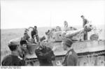 German PzKpfw VI Tiger I heavy tank and its crew, near Kursk, Russia, summer 1943, photo 1 of 2