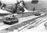 Tiger I heavy tanks of the German 1st SS Division Leibstandarte SS Adolf Hitler on a country road in Northern France, spring 1944, photo 2 of 2