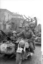 German paratroopers with R75 motorcycle, Italy, 1943-1944; note MG 42 machine gun mounted on the side car