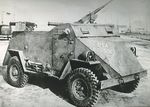 Scout Car S1 (American) at rest, date unknown; note Browning M2 machine gun on top and two Browning M1921 machine guns in rear