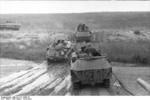 SdKfz. 250/3 and SdKfz. 251 halftrack vehicles in the field, southern Russia, Aug 1942