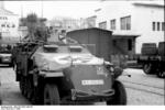 SdKfz. 251 halftrack vehicles, possibly of the German 7th Panzer Division, in a town in Southern France, 1942