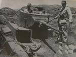Chinese soldiers operating a Russian-built T-26 light tank, China, circa late 1930s