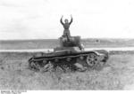 Russian tanker surrendering his T-26 light tank, Aug 1941