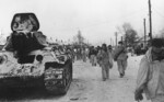 T-34 tank and infantry of Soviet 12th Armored Corps in Rossosh, Russia, 16 Jan 1943