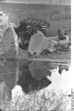 Wrecked Soviet T-34 tank at Nemmersdorf, East Prussia, Germany, late Oct 1944, photo 1 of 3