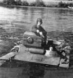 T-37A amphibious tank traveling across a river, 1930s