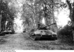 German Tiger II heavy tank with Porsche-built turret at Canteloup, France, Jul 1944, photo 1 of 3