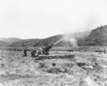 United States Army 105mm Howitzer M2A1 firing, Korea, 22 Jul 1950