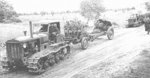 Soviet STZ-3 tractors towing 122 mm Howitzer M1938 (M-30) guns, Jun 1941