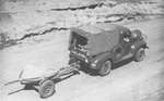 37 mm Gun M3 being towed by a truck, circa 1941