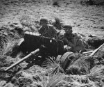 37 mm Gun M3 and crew in exercise, Camp Carson, Colorado, United States, 24 Apr 1943