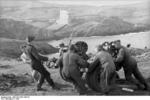 German troops handling the carriage of a 8.8 cm FlaK gun, France, 1942