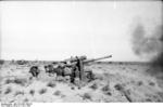 8.8 cm FlaK gun firing at Bir al Hakim, Jun 1942; note General Rommel