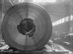 Female worker cleaning the rifling of a BL 15 in gun, Coventry Ordnance works, England, United Kingdom, 1914-1918