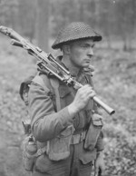 Private H. E. Goddard of Perth Regiment of the Canadian 5th Armored Division near Arnhem, Netherlands, 15 Apr 1945