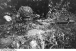 German paratrooper with FG 42 rifle, France, Jun 1944