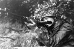 German paratrooper with FG 42 rifle, France, summer 1944