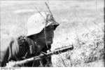 German soldier of Großdeutschland Division  near Achtyrka, Ukraine, Jun 1943; note Kar98k rifle with grenade launcher
