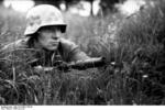 German paratrooper with Kar98k rifle with grenade launcher, France, summer 1944