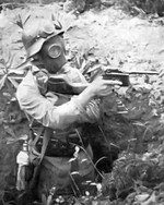 Nationalist Chinese Army soldier wearing a German-style helmet and a gas mask while wielding a Mauser C96 (M1932) pistol, date unknown