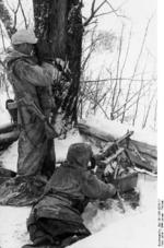 German MG42 machine gun crew in Russia, Jan 1944; Sturmgewehr 44 assault rifle