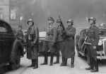 Jürgen Stroop (center) during the Warsaw Ghetto Uprising, on Nowolipie Street near intersection of Smocza Street, Poland, Apr-May 1943; note Karl Kaleske or Erich Steidtmann next to him, Heinrich Klaustermeyer (with MP 40), and Josef Blösche (with MP 28)