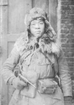 Japanese soldier in winter gear with Nambu Type 14 handgun, China, circa 1930s