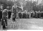 German soldier explaining the use of Panzerfaust to Berlin civilians, Germany, spring 1945