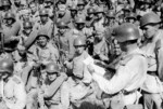 Soviet officer reading attack orders to his men, Eastern Front, date unknown; note PPSh-41 submachine guns