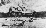 Japanese troops with an armored car and a Type 96 machine gun, date unknown