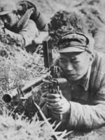 Chinese soldier of the Japanese-sponsored Nanjing puppet government with a ZB vz. 26 light machine gun, China, circa 1940s