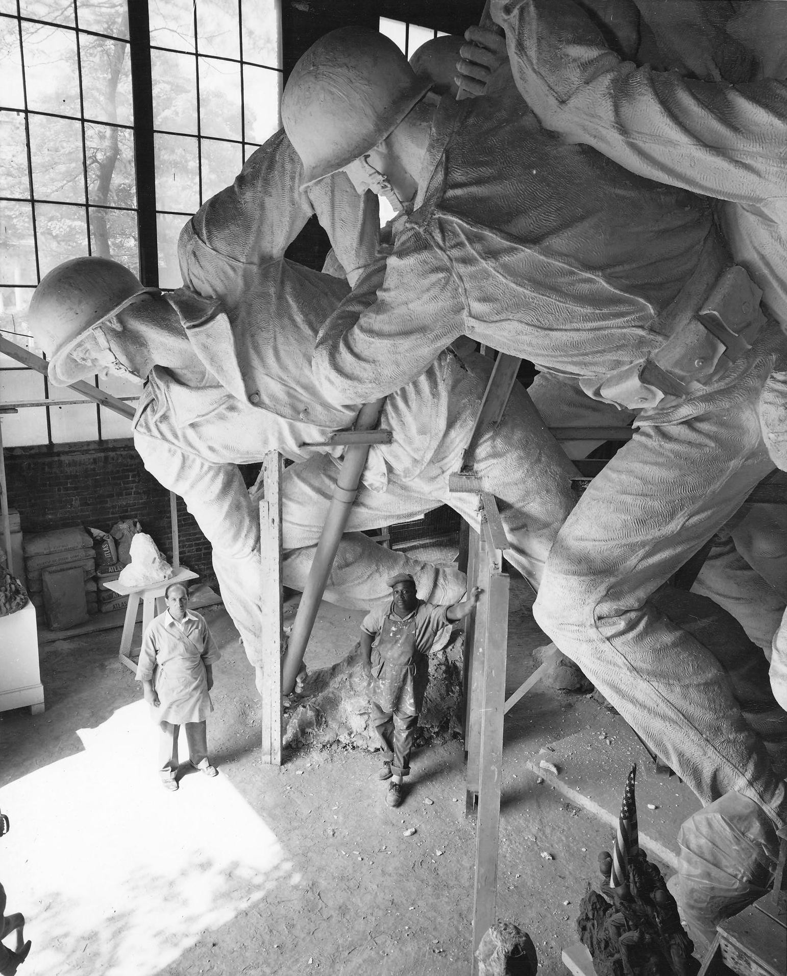 Sculptor Felix de Weldon working on the plaster model of the US Marine Corps War Memorial, circa 1954, photo 1 of 7