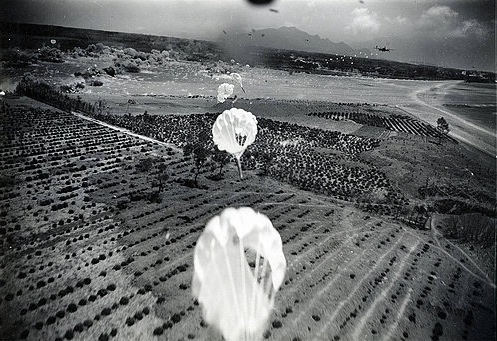 US bombers attacking Lamsepo Airfield with parafrag bombs, Linkou, Taiwan, 14 Apr 1945, photo 1 of 3