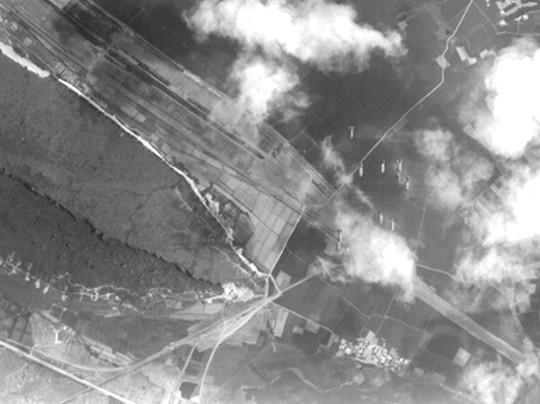 Bombing dropping on the rail station at Toshien District, Takao (now Zuoying District, Kaohsiung), Taiwan, 16 Oct 1944