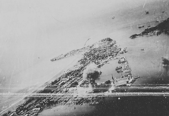 Takao (now Kaohsiung) harbor, Taiwan under US Navy carrier aircraft attack, 12 Oct 1944, photo 5 of 6