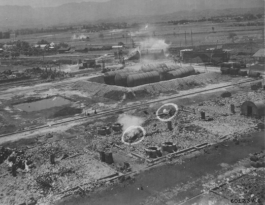 Kagi butanol plant under attack by B-25 bombers of 3rd Bombardment Group, USAAF 5th Air Force, Kagi (now Chiayi), Taiwan, 3 Apr 1945, photo 2 of 5