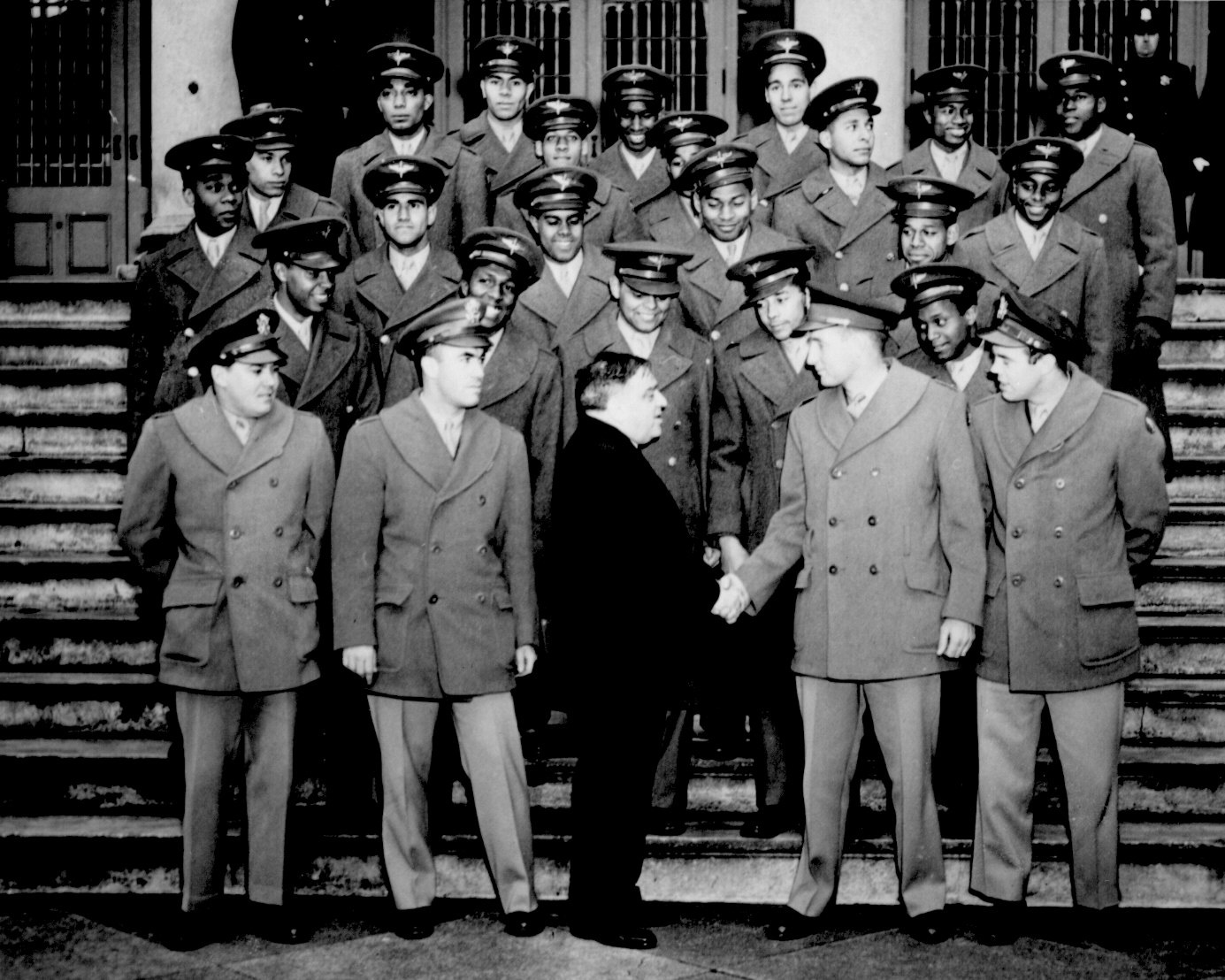 Mayor Fiorello H. La Guardia of New York City, New York, United States greeting Major Galen B. Price and his African-American cadets of US Army Air Forces, 16 Feb 1944