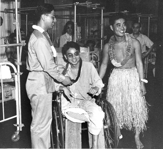 Japanese-American members of US Army entertaining wounded soldiers at Walter Reed Hospital, Washington, DC, United States, date unknown, photo 2 of 2