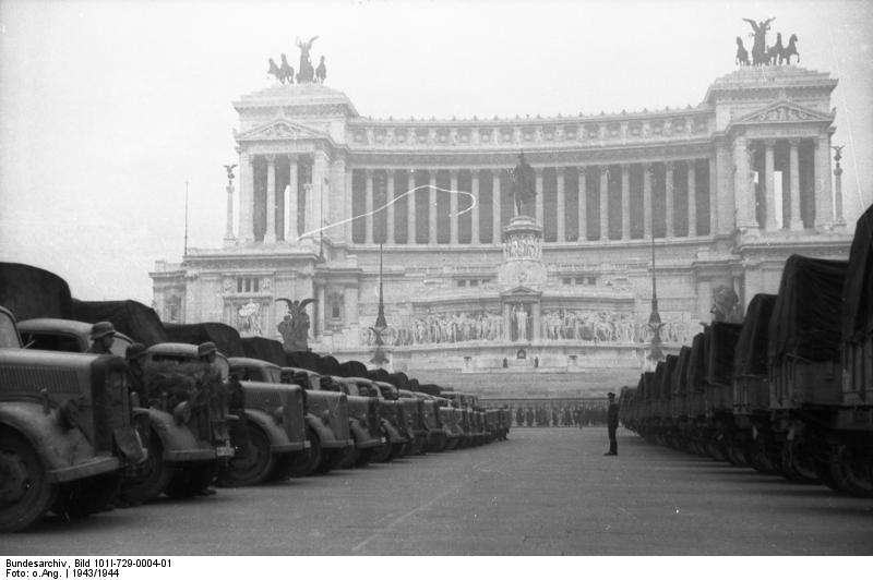 German trucks parked before the Monument to Vittorio Emanuele II in Rome, Italy, 4 Jan 1944; they were about to be used to transfer Italian artwork to Germany