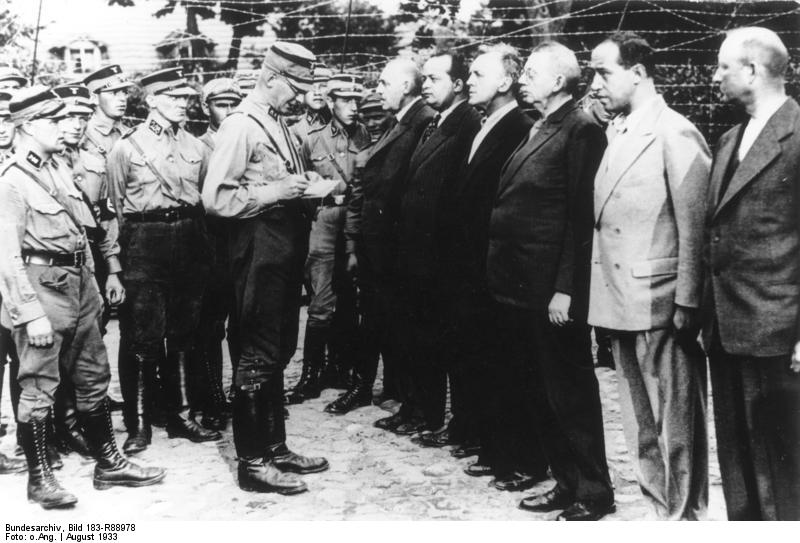 German SA men with political prisoners at Oranienburg Concentration Camp, Brandenburg, Germany, Aug 1933