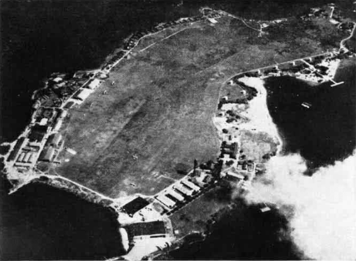 Aerial view of Ford Island, Oahu, US Territory of Hawaii, 1930; seen in Oct 1965 issue of US Navy publication Naval Aviation News