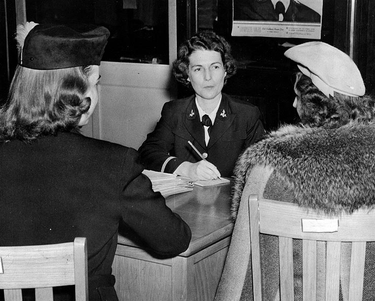 WAVES Ensign May Herrmann recruiting two women at the Officer Procurement office, Philadelphia, Pennsylvania, United States, 30 Oct 1942