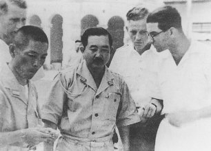Tatsunosuke Ariizumi with German Navy submarine officers, Penang, Straits Settlements, date unknown