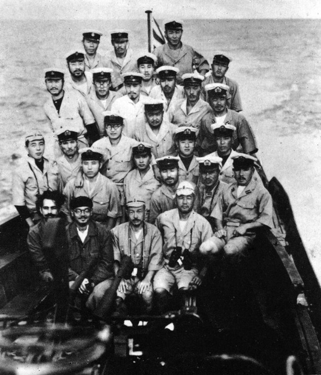 Crew of Japanese submarine I-29 posing with Subhash Chandra Bose off Madagascar, 28 Apr 1943